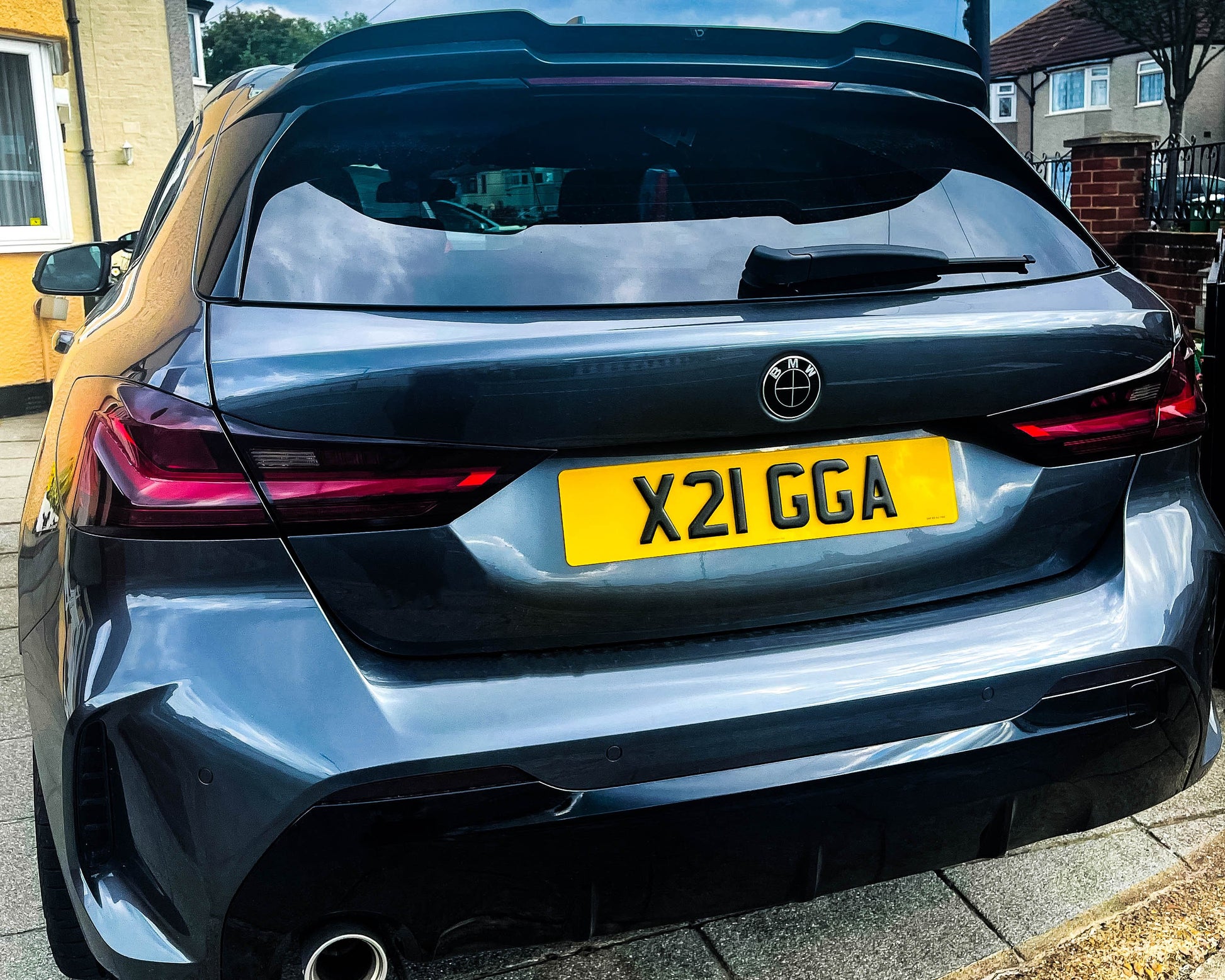 Full Black Gloss V2 BMW badge overlay by SuperWrappz for F40/G20/G30 2017-plus BMWs, aftermarket cast vinyl