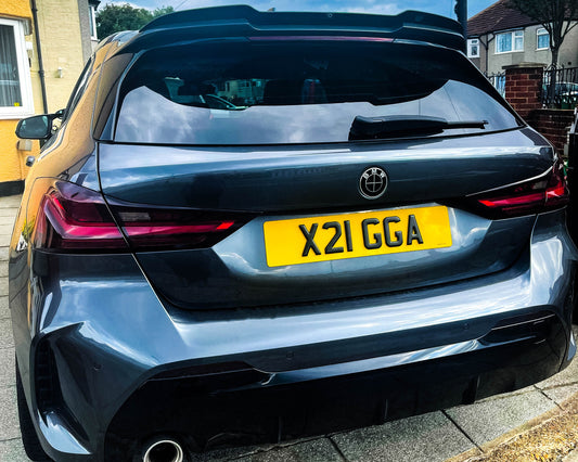 Full Black Gloss V2 BMW badge overlay by SuperWrappz for F40/G20/G30 2017-plus BMWs, aftermarket cast vinyl
