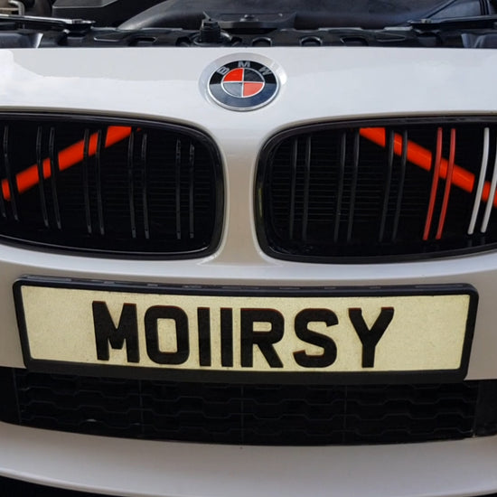 Showcasing the Red Luminescent crash bars set on a 4 series convertible