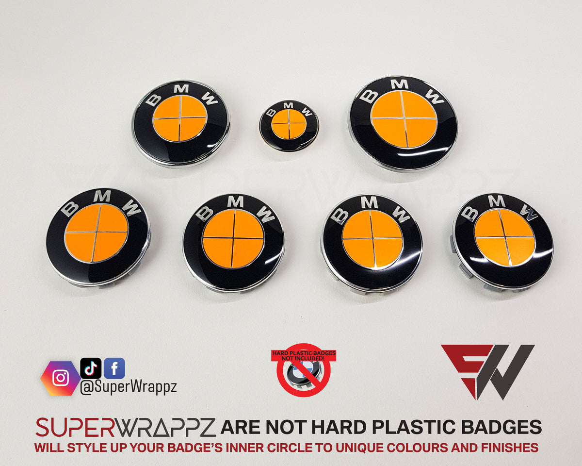 Full Orange Fluorescent BMW badge overlay by SuperWrappz on E/F Series emblems, aftermarket cast-vinyl set