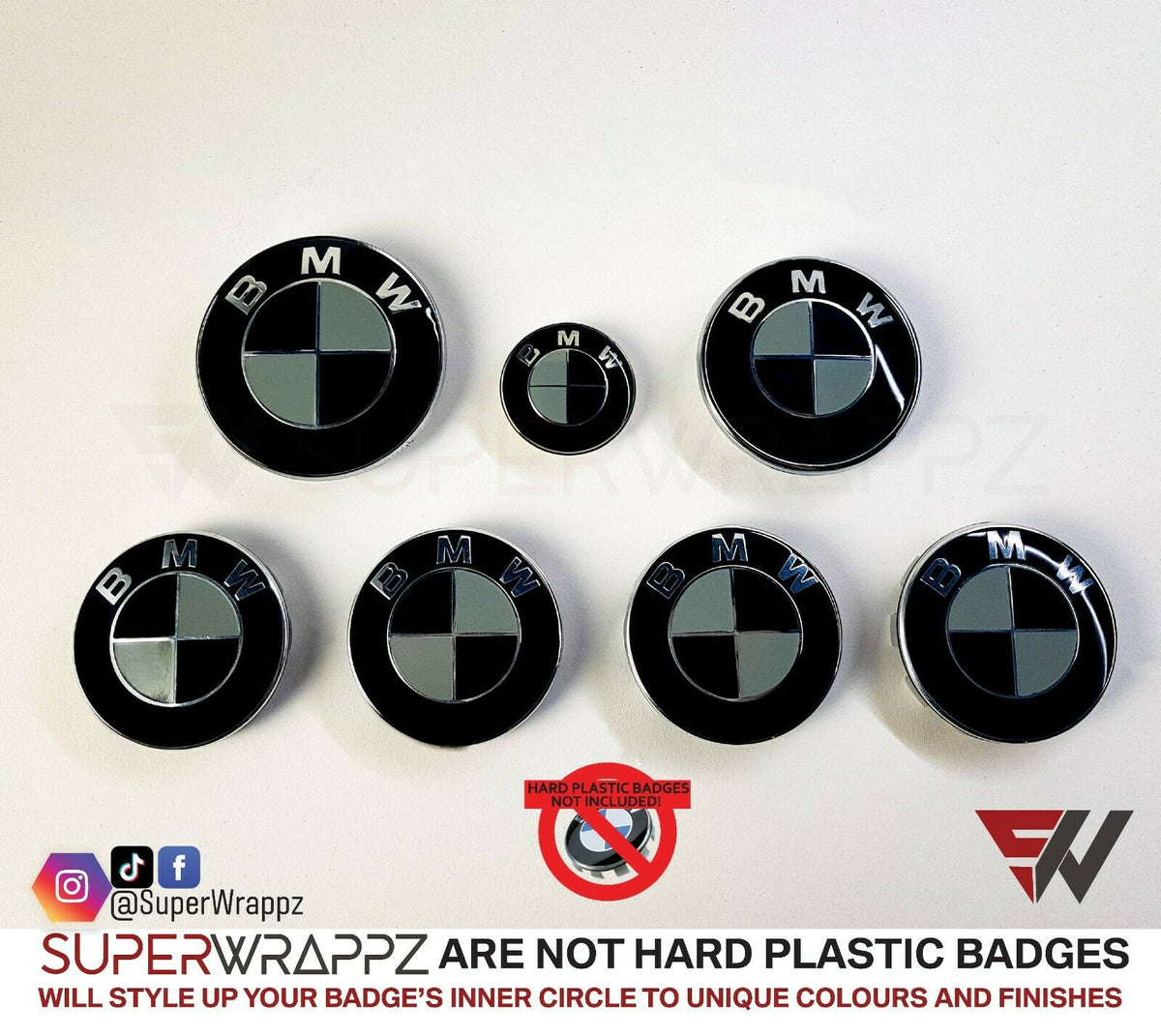Black and Grey Gloss BMW badge overlay by SuperWrappz on E/F Series emblems, aftermarket cast-vinyl set