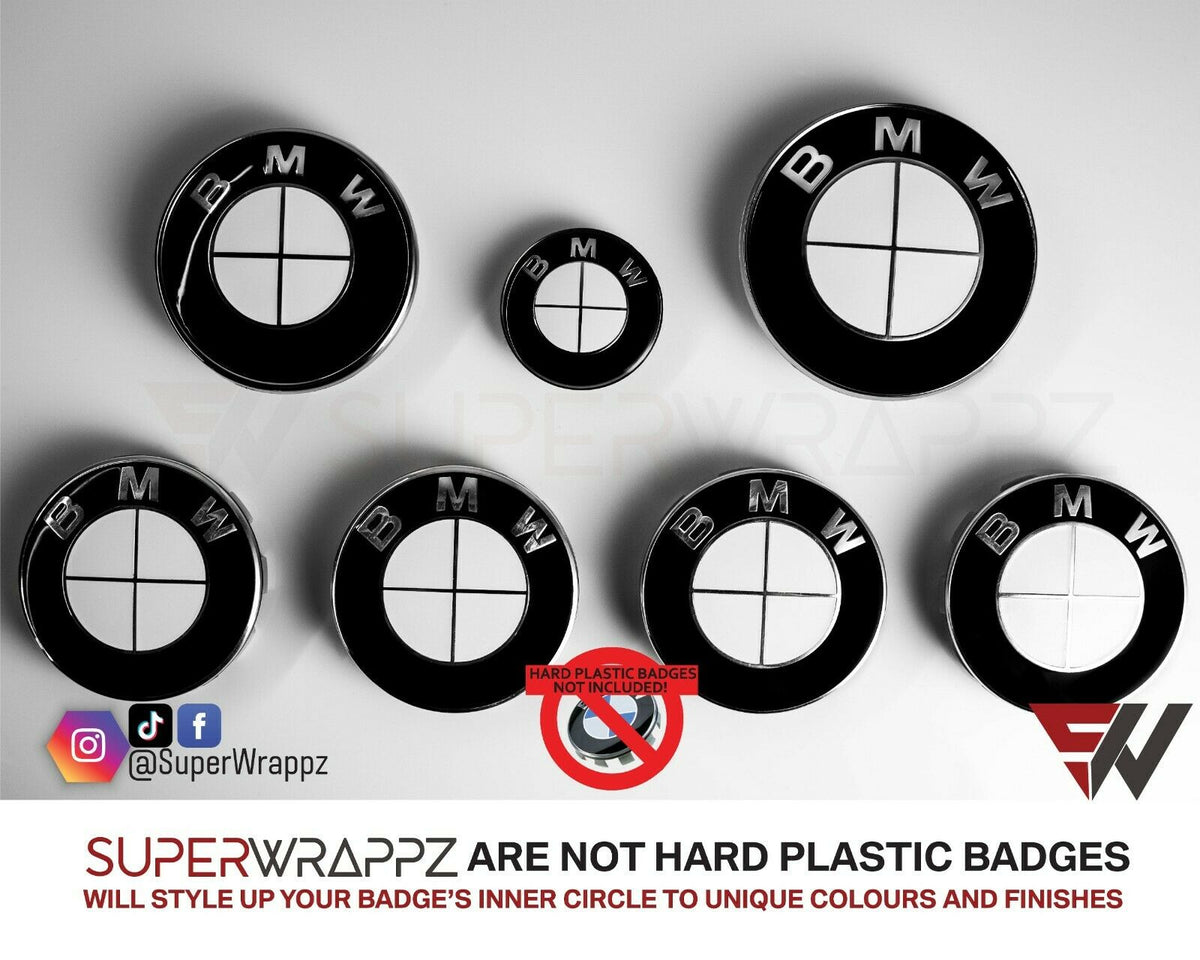 Full White Gloss BMW badge overlay by SuperWrappz on E/F Series emblems, aftermarket cast-vinyl set