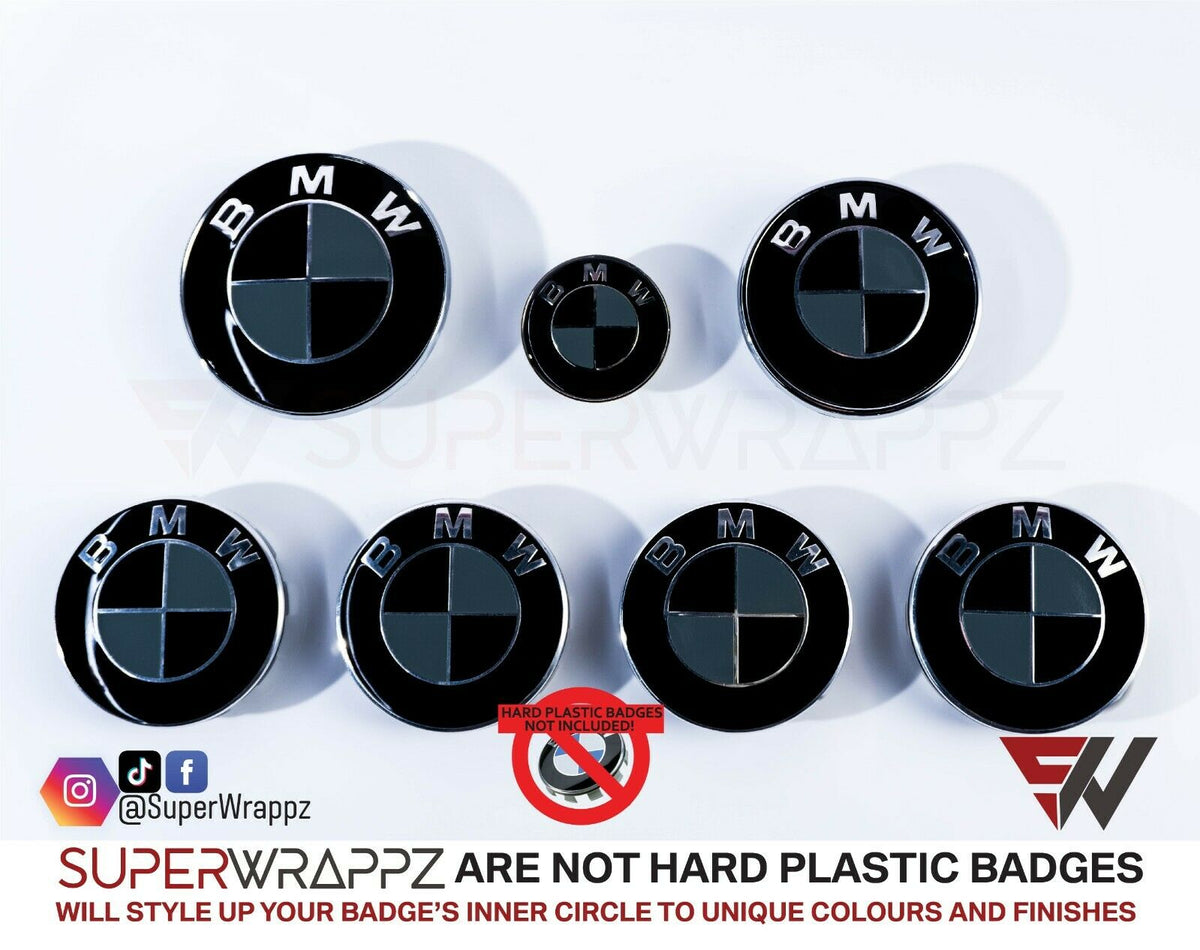 Black and Dark Grey Gloss BMW badge overlay by SuperWrappz on E/F Series emblems, aftermarket cast-vinyl set