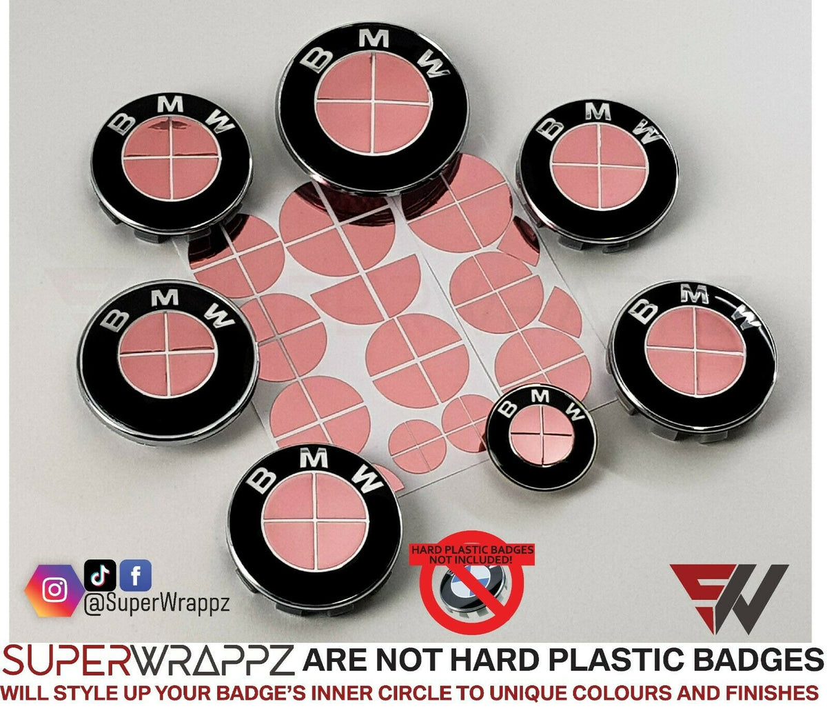 Chrome Rose Gold BMW badge overlay, complete badge set laid out on a plain background