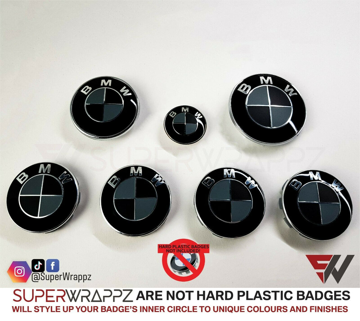 Black and Dark Grey Matte BMW badge overlay by SuperWrappz on E/F Series emblems, aftermarket cast-vinyl set