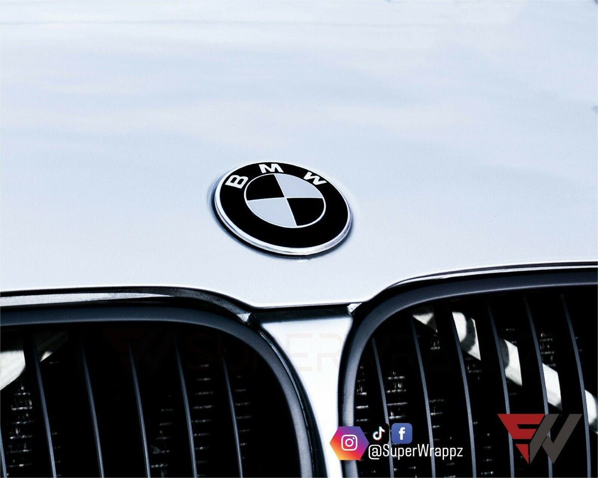 Black & Silver Gloss BMW badge overlay applied to the front hood badge, close-up