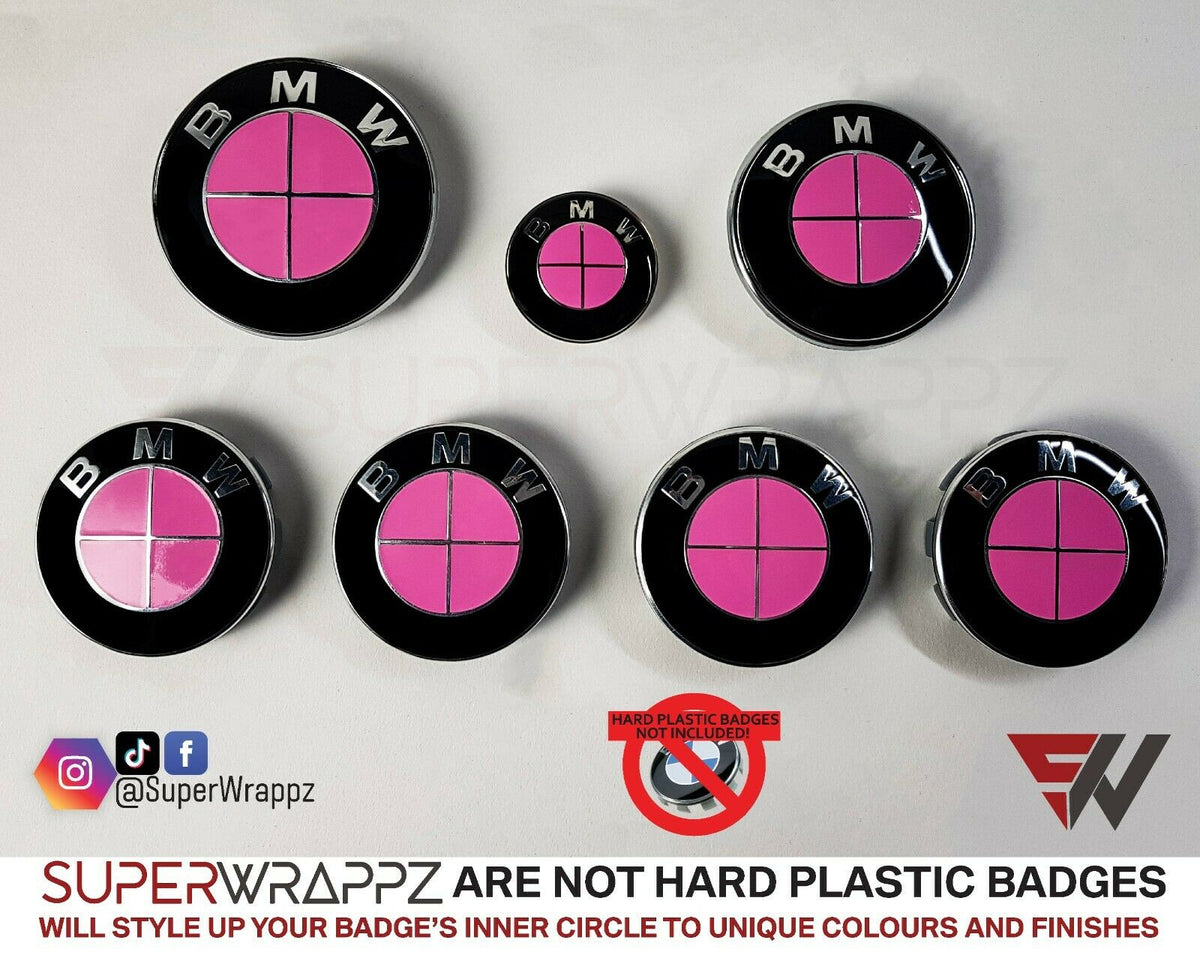 Full Pink Gloss BMW badge overlay by SuperWrappz on E/F Series emblems, aftermarket cast-vinyl set